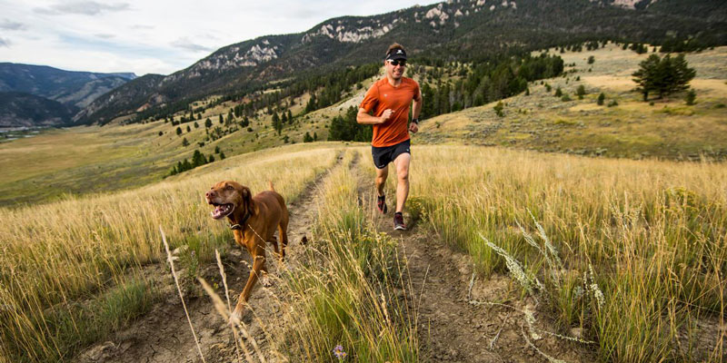 Man running with his dog